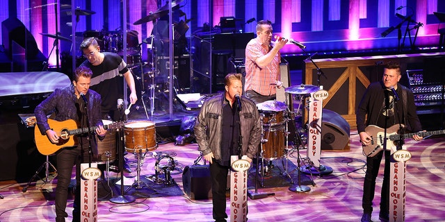 Rascal Flatts singer Gary Levox, middle, said he's still trying to wrap his head around the band's split.