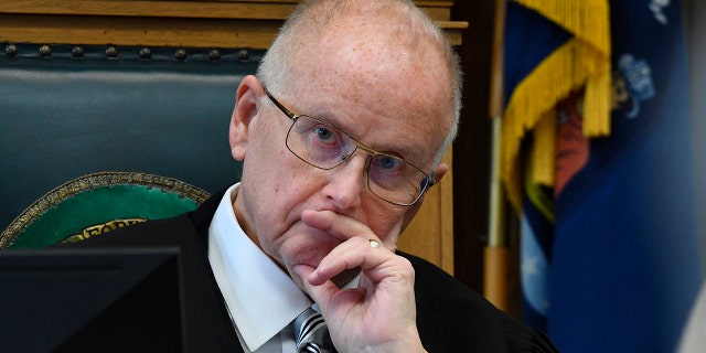 Circuit Court Judge Bruce E. Schroeder listens during the pretrial hearing of Kyle Rittenhouse in Kenosha Circuit Court on Monday in Kenosha, Wisconsin.