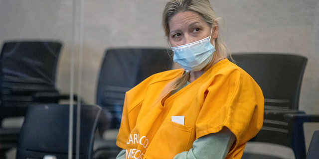 Shannon O'Connor listens in a courtroom, Wednesday, Oct. 20, 2021 in San Jose, Calif. Bail was denied for O'Connor, a California mother accused of hosting alcohol-fueled parties for her teenage son and his friends where she encouraged them to drink and have sex with intoxicated girls.