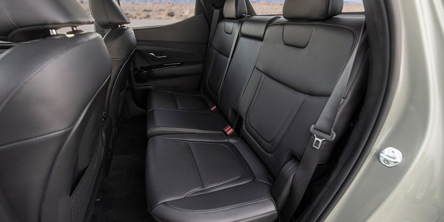 The rear seat is as roomy as a midsize pickup's.