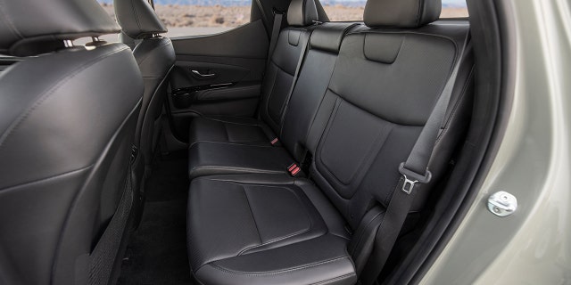 The rear seat is as roomy as a midsize pickup's.