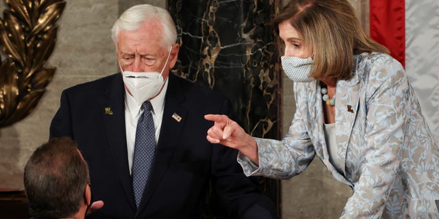 U.S. House Majority Leader Steny Hoyer (D-MD) and Speaker of the House Nancy Pelosi (D-CA) wait during votes at the first session of the 117th Congress in the House Chamber at the U.S. Capitol in Washington, DC, U.S., January 3, 2021. Tasos Katopodis/Pool via REUTERS