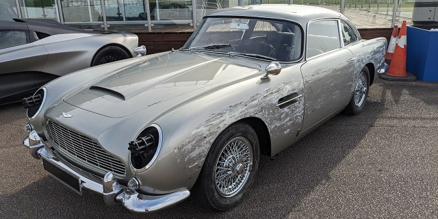 The DB5 wears its on-screen scars from a chase scene shot in Matera, Italy.