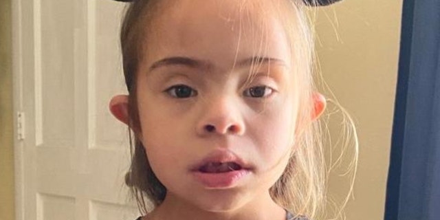 A Florida father is accusing educators at his daughter's elementary school of forcing his daughter with Down syndrome to wear a mask by tying it to her head for about six weeks. (Credit: Jeffrey Steele)