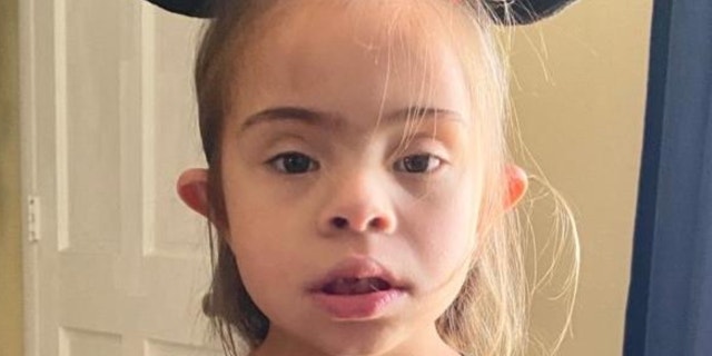 A Florida father is accusing educators at his daughter's elementary school of forcing his daughter with Down syndrome to wear a mask by tying it to her head for about six weeks. (Credit: Jeffrey Steele)