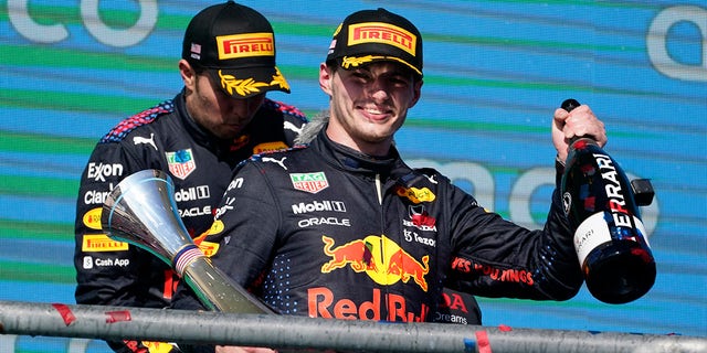 Red Bull driver Max Verstappen, front, celebrates is U.S. Grand Prix victory.