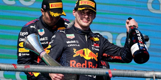 Red Bull driver Max Verstappen, front, celebrates is U.S. Grand Prix victory.