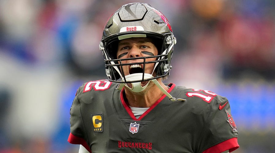 Tampa Bay Buccaneers quarterback Tom Brady (12) puts on his helmet during  the second half of an NFL football game against the New England Patriots,  Sunday, Oct. 3, 2021, in Foxborough, Mass. (