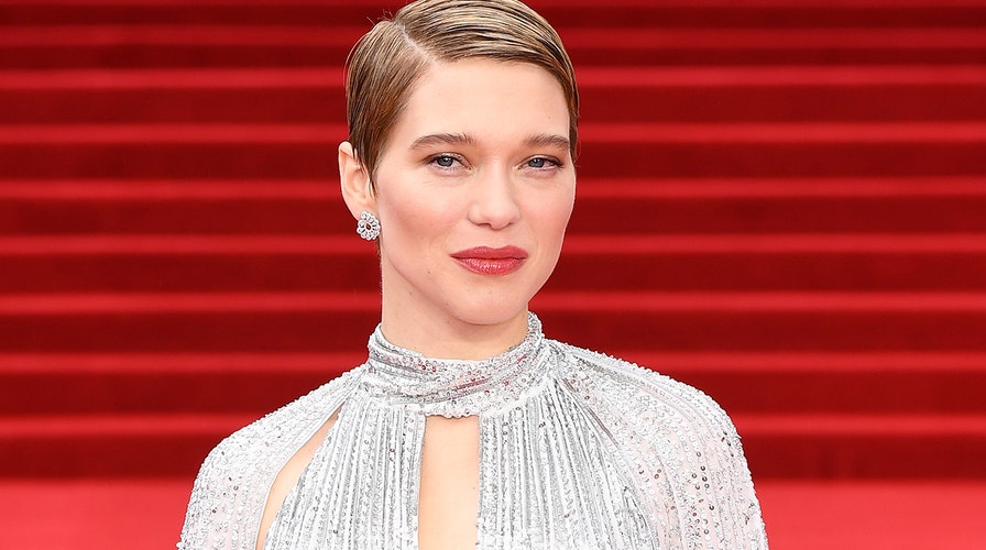 Bond girl Lea Seydoux debuts new light blonde pixie cut as she steps out in  a modest black-and-white ensemble at The French Dispatch screening in Paris