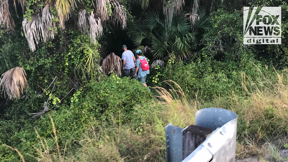 Chris and Roberta Laundrie in the Myakkahatchee Creek Environmental Park on the morning police discovered their son's skeletal remains.