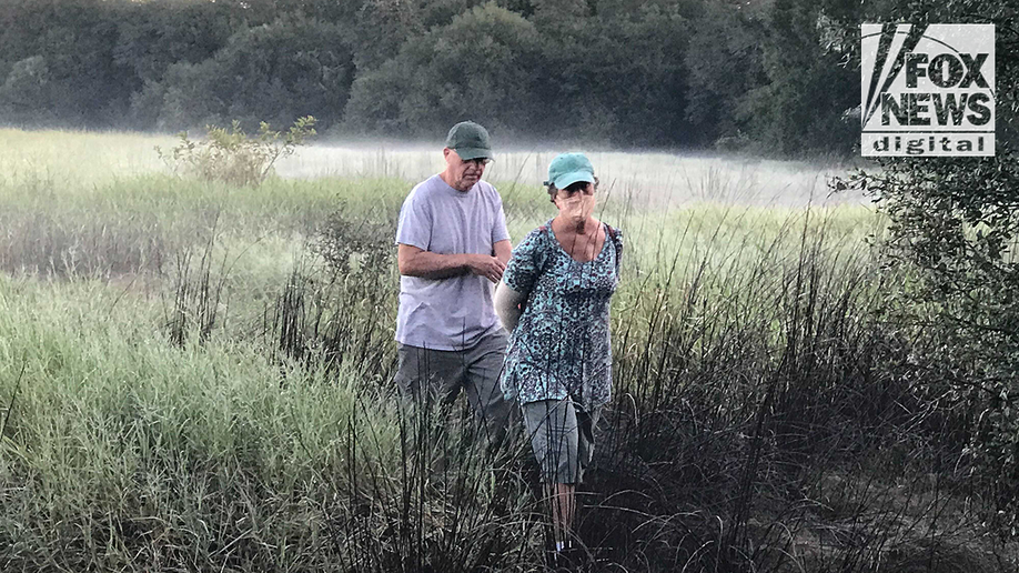 Chris and Roberta Laundrie in the Myakkahatchee Creek Environmental Park on the morning police discovered their son's skeletal remains.