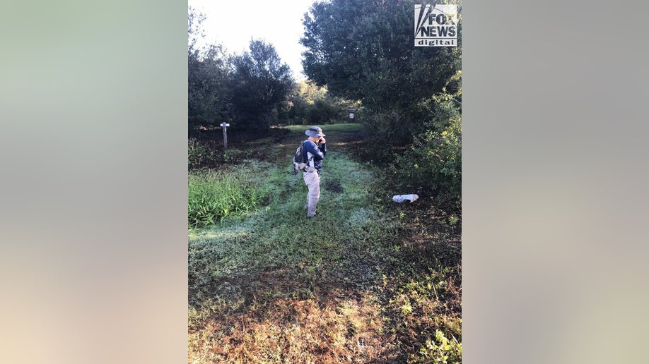 Fox News images show Chris and Roberta Laundrie in the Myakkahatchee Creek Environmental Park with at least one law enforcement officer on Wednesday
