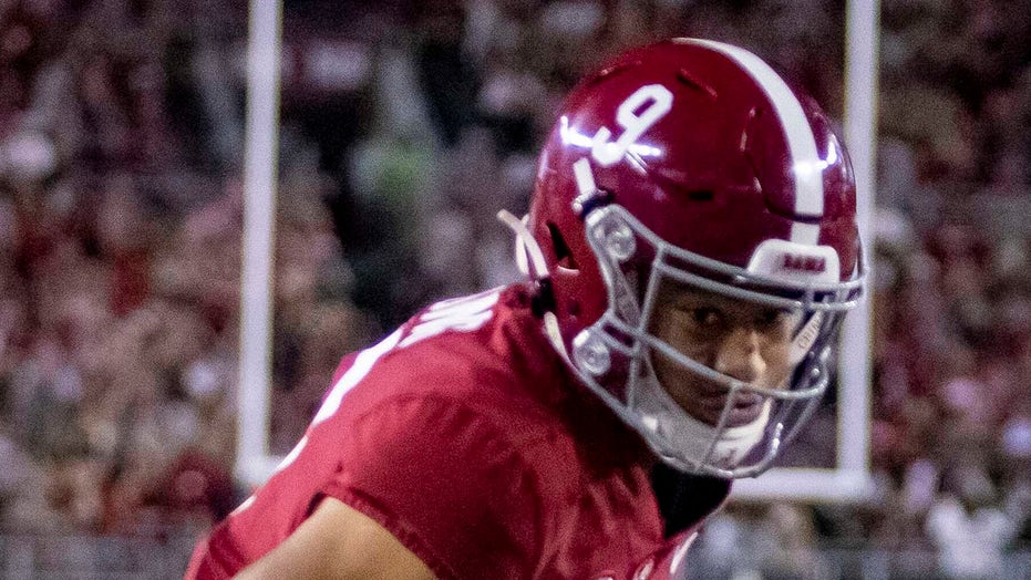 Young, Robinson power No. 4 Alabama past Tennessee 52-24