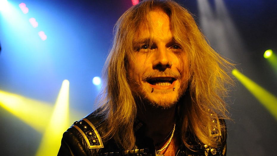 Judas Priest’s Richie Faulkner hospitalized after ‘aortic aneurysm’ on stage
