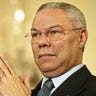 (Original Caption) Secretary of State Colin Powell listens as President Bush speaks on trade promotion authority at the Department of State. (Photo by �� Brooks Kraft/CORBIS/Corbis via Getty Images)