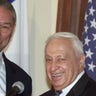 U.S. Secretary of State Colin Powell (L) and Israeli Prime Minister elect Ariel Sharon meet in Jerusalem for talks February 25, 2001. [Powell continues his whirlwind Middle East tour for talks with Israeli and Palestinian leaders.     ]