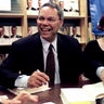 General Colin Powell, retired Chairman of the Joint Chiefs of Staff, signs a book in San Francisco September 25