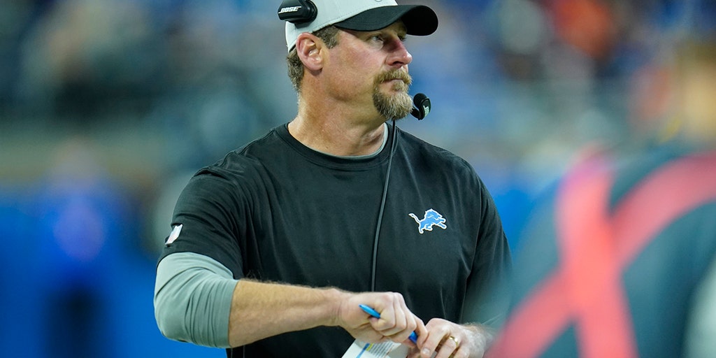 DETROIT, MI - NOVEMBER 06: The Down Judge motions for Detroit Lions Head  Coach Dan Campbell to stay back as he tries to argue for a replay under two  minutes during the