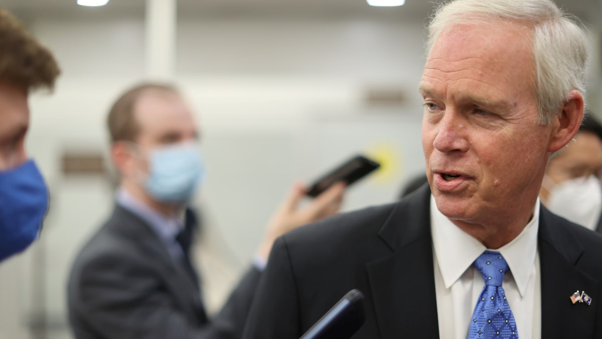 U.S. Senator Ron Johnson (R-WI) talks to reporters as he arrives for the U.S. Senate vote on the $1 trillion bipartisan infrastructure bill on Capitol Hill in Washington, U.S., August 10, 2021. 