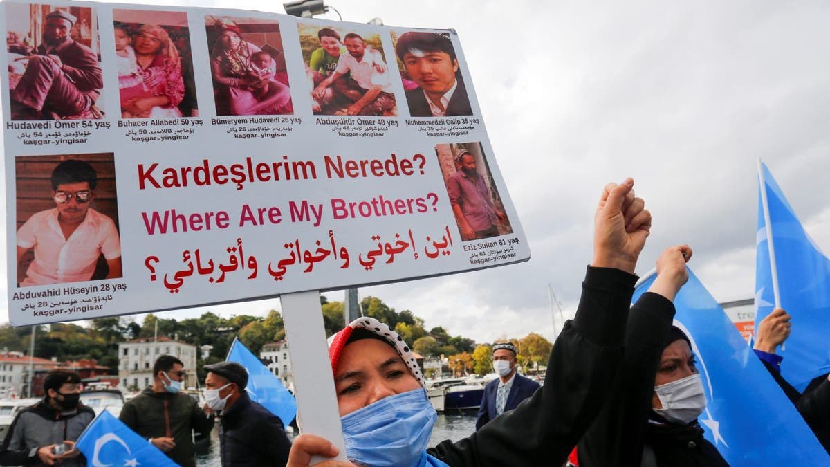 Ethnic Uighur demonstrators take part in a protest against China, in Istanbul, Turkey, Oct. 1, 2021. 