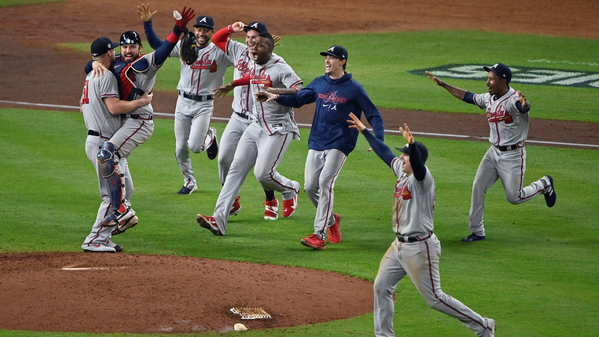Nov 2, 2021; Houston, Texas, USA; Atlanta Braves players celebrate on the field after defeating the Houston Astros during game six of the 2021 World Series at Minute Maid Park. Mandatory Credit: Jerome Miron-USA TODAY Sports     TPX IMAGES OF THE DAY
