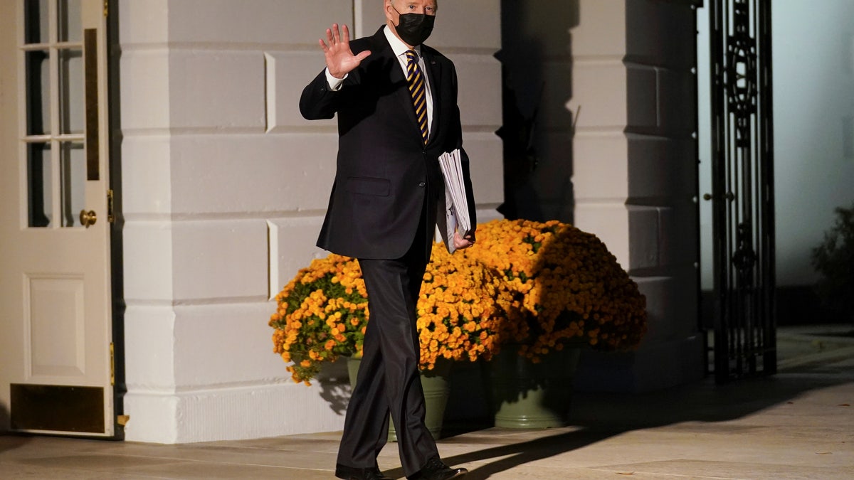 U.S. President Joe Biden departs for Camp David for the weekend from the White House in Washington, U.S., November 12, 2021. REUTERS/Kevin Lamarque