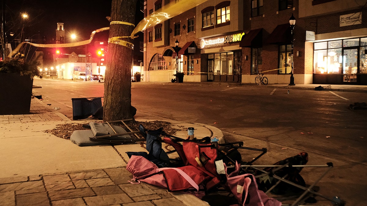 Chairs are left abandoned after a car plowed through a holiday parade in Waukesha, Wisconsin