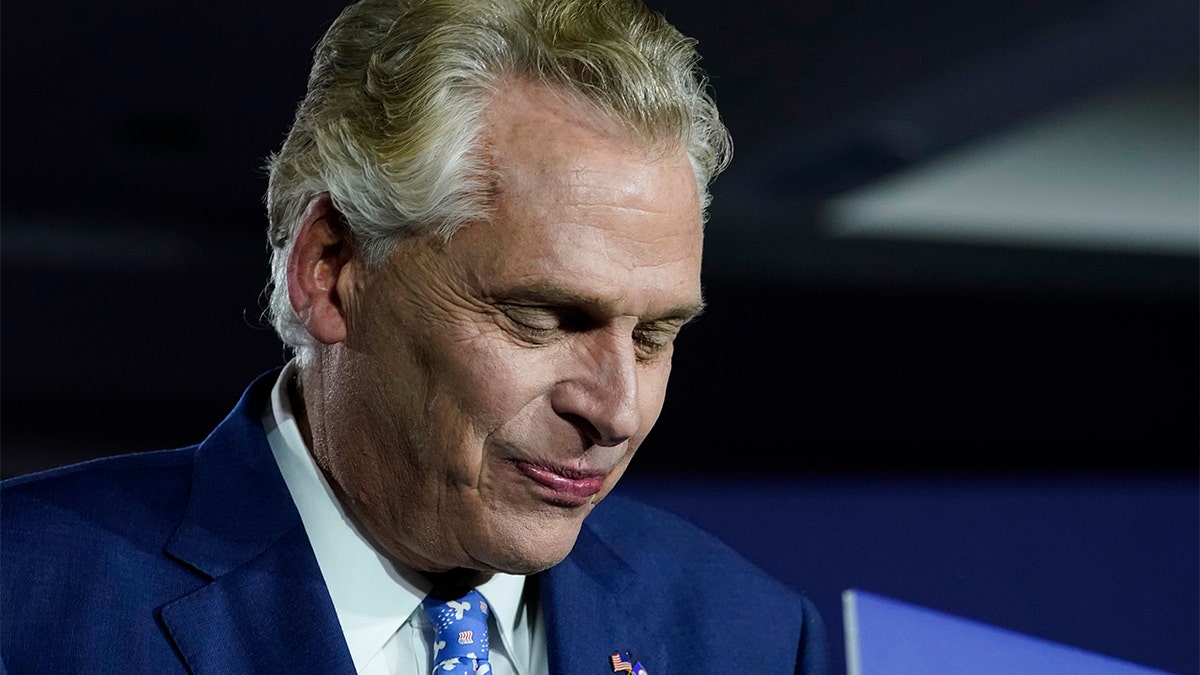 Democratic gubernatorial candidate Terry McAuliffe prepares to speak at an election night party in McLean, Virginia