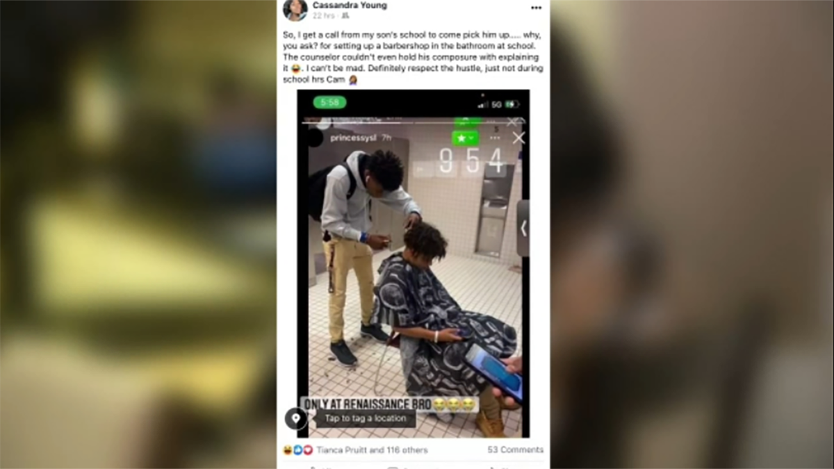 16-year-old Cameron Tucker gives a haircut in his high school's restroom. The teen was given a one-day suspension for playing bathroom barber in Detroit, Michigan.