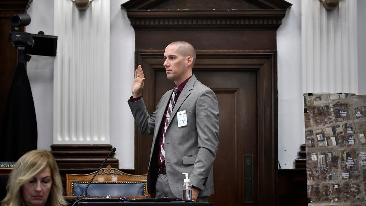 Kenosha Police Department Detective Martin Howard swears in before giving testimony at Kyle Rittenhouse's trial at the Kenosha County Courthouse in on Wednesday, Nov. 3, 2021.