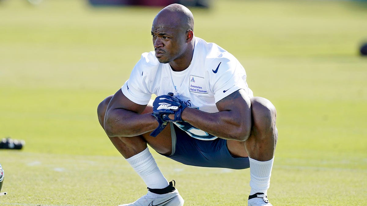 Tennessee Titans running back Adrian Peterson warms up during an NFL football practice Friday, Nov. 5, 2021, in Nashville, Tenn. The Titans signed 2012 NFL MVP and four-time All-Pro running back Peterson to help replace injured NFL rushing leader Derrick Henry.