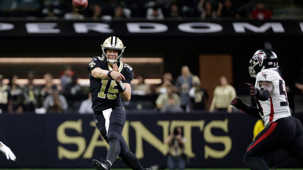 New Orleans Saints quarterback Trevor Siemian (15) makes a throw against the Atlanta Falcons during the first half Sunday, Nov. 7, 2021, in New Orleans. (AP Photo/Derick Hingle)