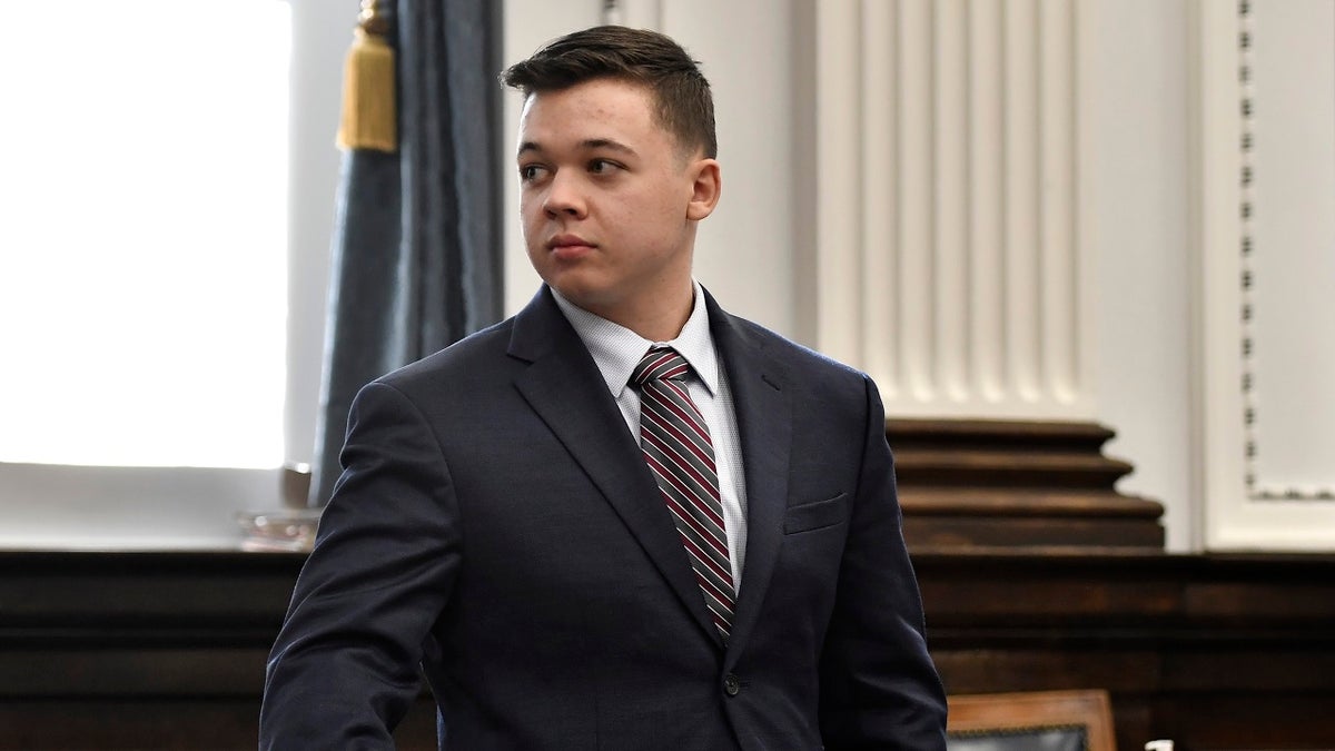 Kyle Rittenhouse looks back to the gallery during a break in testimony from Gaige Grosskreutz during his trial at the Kenosha County Courthouse in Kenosha, Wis., on Monday, Nov. 8, 2021. 