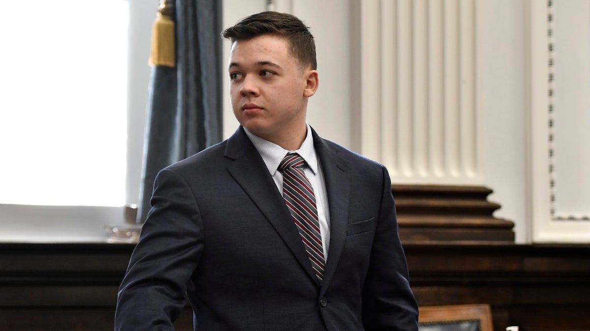 Kyle Rittenhouse looks back to the gallery during a break in testimony from Gaige Grosskreutz during his trial at the Kenosha County Courthouse in Kenosha, Wis., on Monday, Nov. 8, 2021.
