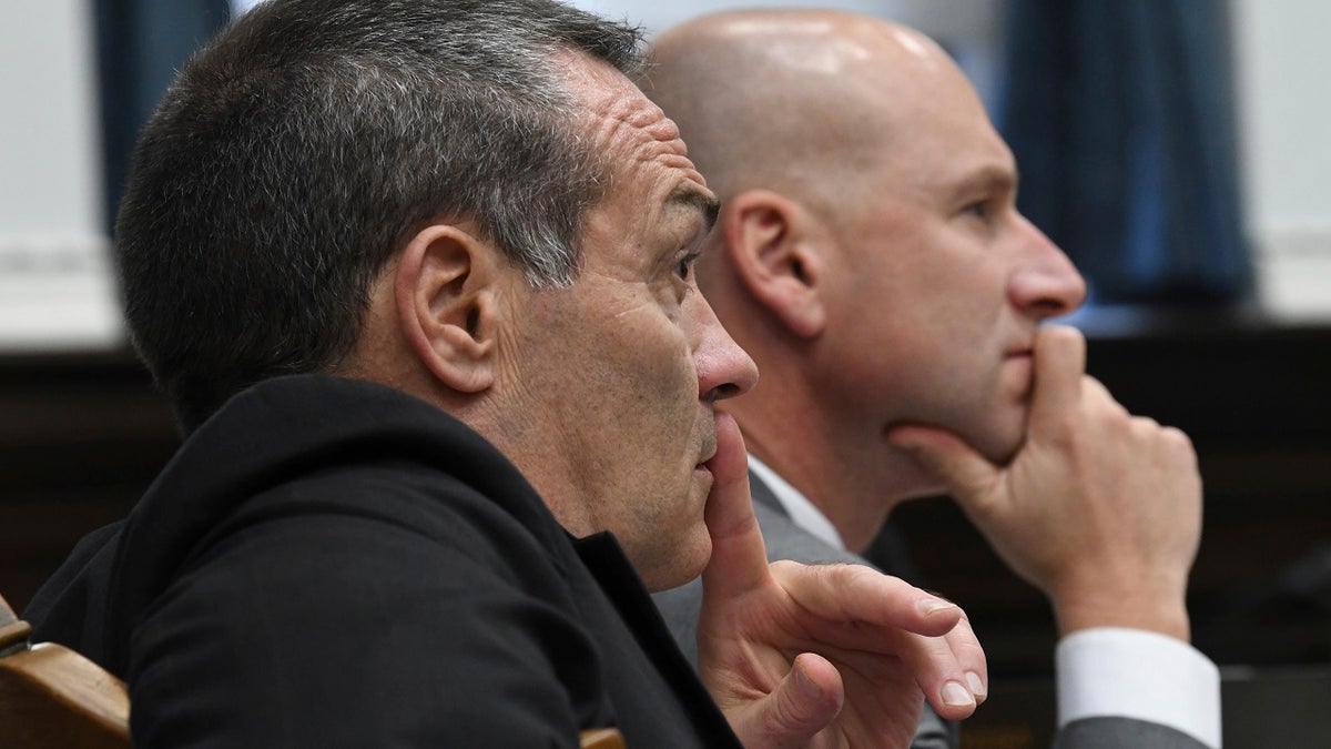 Defense attorneys Mark Richards and Corey Chirafisi, listen as  defense witness Frank Hernandez is cross examined during Kyle Rittenhouse's trial about the video he took on the night of Aug. 25, 2020, at the Kenosha County Courthouse in Kenosha, Wis., on Thursday, Nov. 11, 2021. (Mark Hertzberg/Pool Photo via AP)