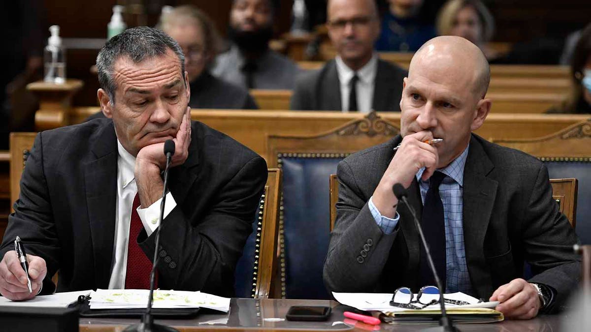 Kyle Rittenhouse's attorneys, Mark Richards, left, and Corey Chirafisi, listen as Judge Bruce Schroeder talks during the trial at the Kenosha County Courthouse