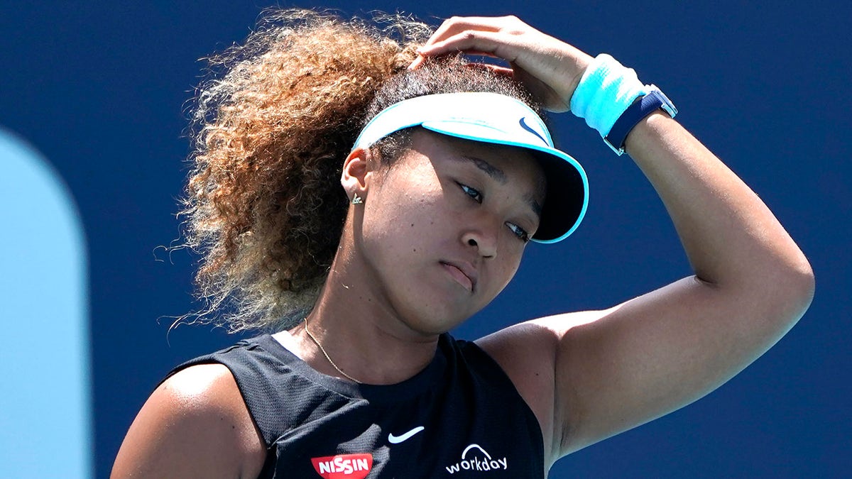 Naomi Osaka, of Japan, reacts during her match against Maria Sakkari, of Greece, in the quarterfinals of the Miami Open tennis tournament in Miami Gardens, Fla., on March 31, 2021. (AP Photo/Lynne Sladky, File)