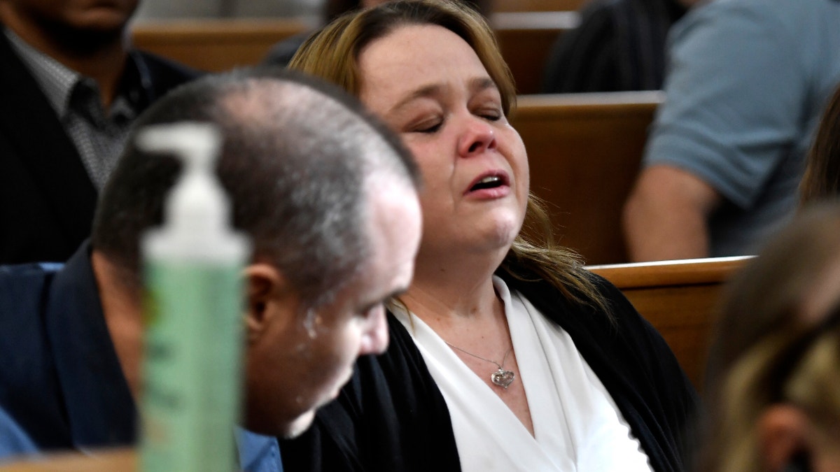 Kyle Rittenhouse's mother, Wendy Rittenhouse, reacts as her son is found not guilt on all counts at the Kenosha County Courthouse in Kenosha, Wis., on Friday, Nov. 19, 2021. The jury came back with its verdict afer close to 3 1/2 days of deliberation. (Sean Krajacic/The Kenosha News via AP, Pool)