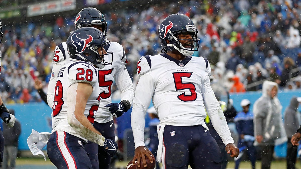 Houston Texans quarterback Tyrod Taylor (5) celebrates after scoring a touchdown against the Tennessee Titans in the first half of an NFL football game Sunday, Nov. 21, 2021, in Nashville, Tenn.