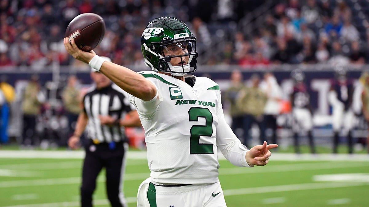 New York Jets quarterback Zach Wilson passes in the first half of a game against the Houston Texans in Houston, Sunday, Nov. 28, 2021. 