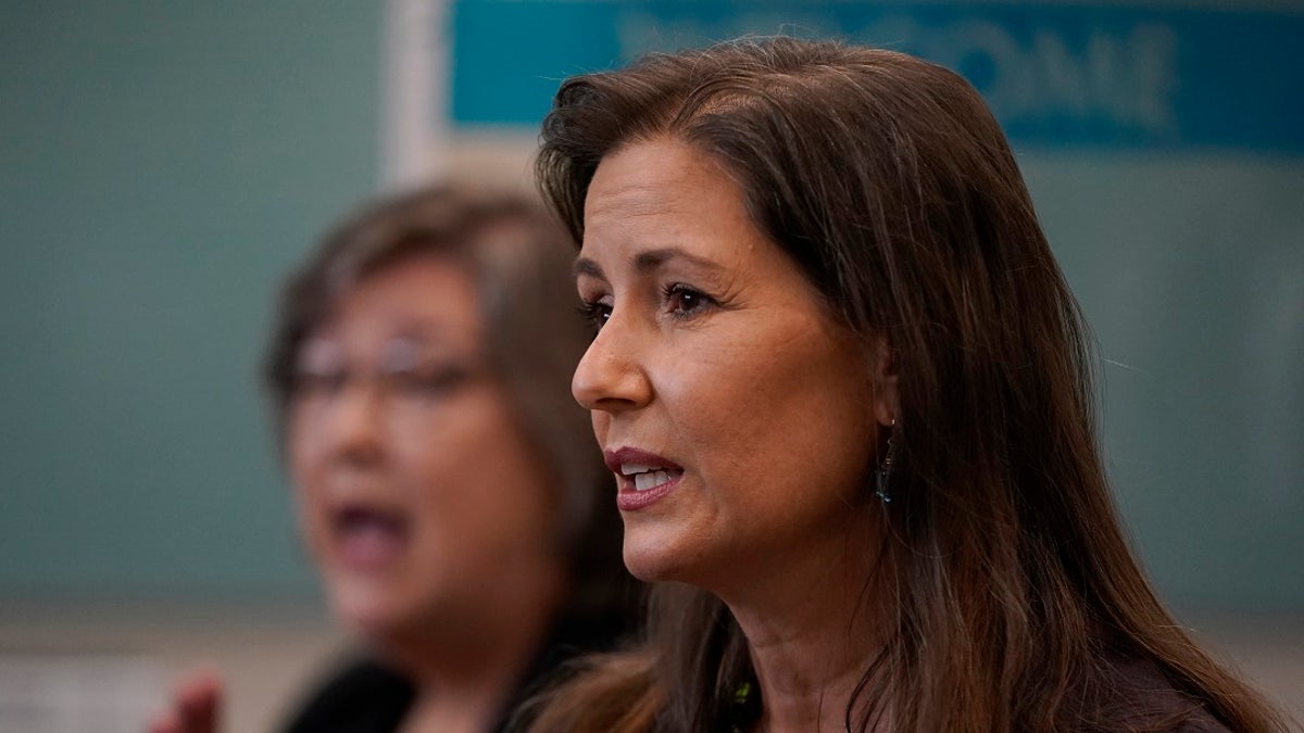 Oakland Mayor Libby Schaaf speaks at a news conference in Oakland, Calif., on July 26, 2021. Oakland officials will reverse plans to cut police funding and seek to hire more officers as soon as possible, Schaaf said Monday, as a spate of gun violence and fatal shootings has left residents on edge.