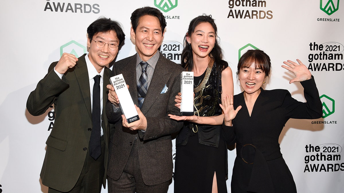 Kwang Dong-hyuk, left, Lee Jung-jae, Jung Ho-yeon and Kim Ji-yeon pose with the breakthrough series–long format award at the Gotham Awards on Monday, Nov. 29, 2021, in New York. 