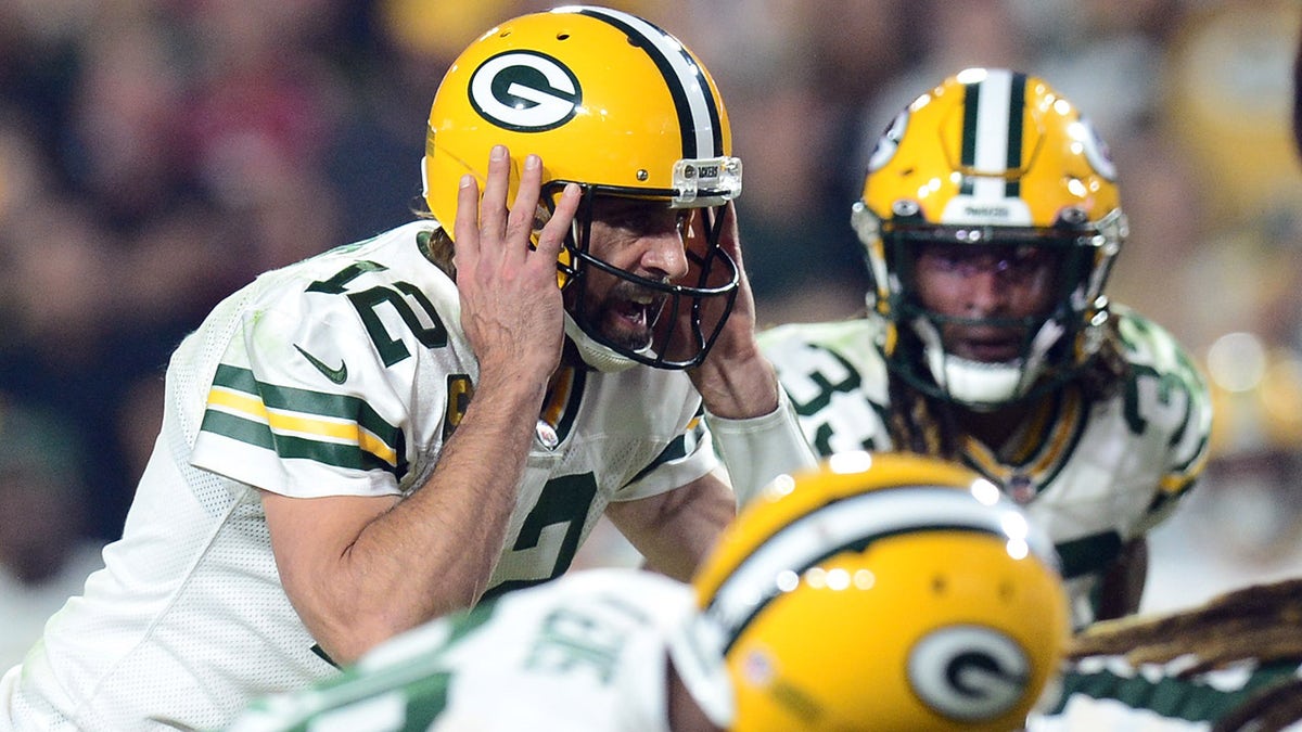 Green Bay Packers quarterback Aaron Rodgers calls signals against the Arizona Cardinals at State Farm Stadium on Oct. 28, 2021, at Glendale, Arizona.