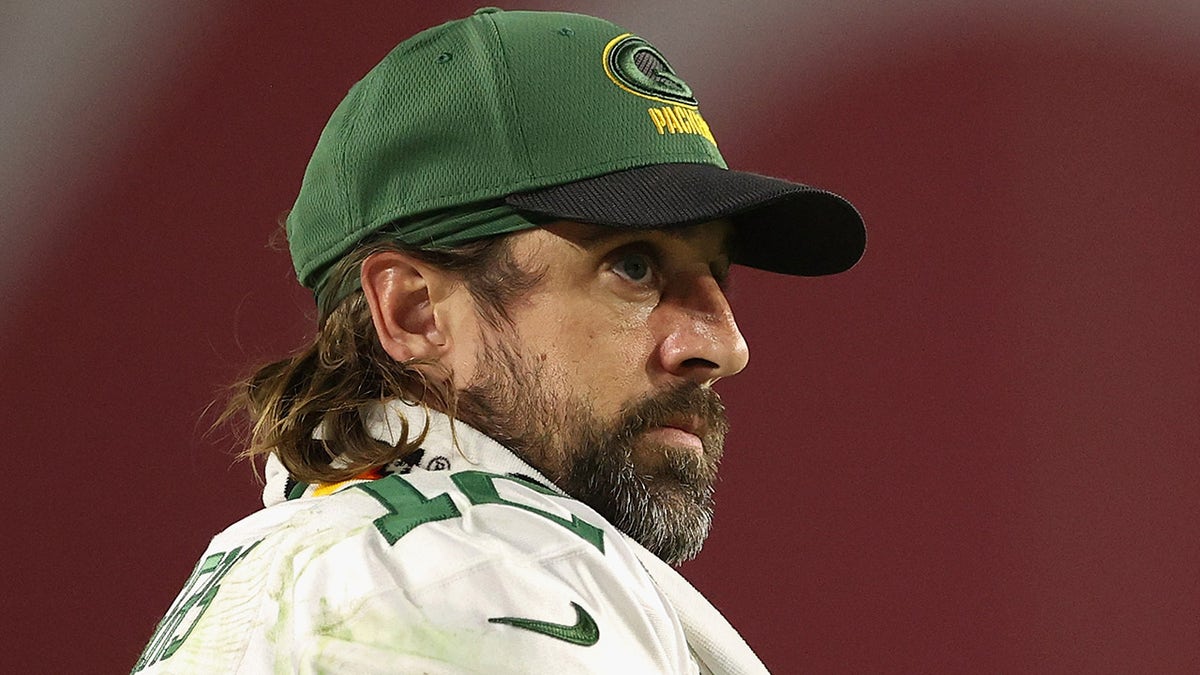 Quarterback Aaron Rodgers #12 of the Green Bay Packers watches from the sidelines during an NFL game at State Farm Stadium on Oct. 28, 2021, in Glendale, Arizona. 