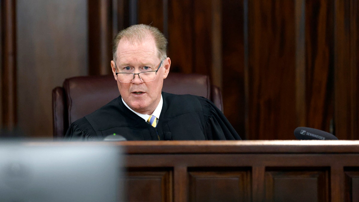Superior Court Judge Timothy Walmsley speaks during opening statements  in the trial of Greg McMichael and his son, Travis McMichael, and a neighbor, William "Roddie" Bryan at the Glynn County Courthouse, Friday, Nov. 5, 2021, in Brunswick, Ga.  The three are charged with the February 2020 slaying of 25-year-old Ahmaud Arbery.  