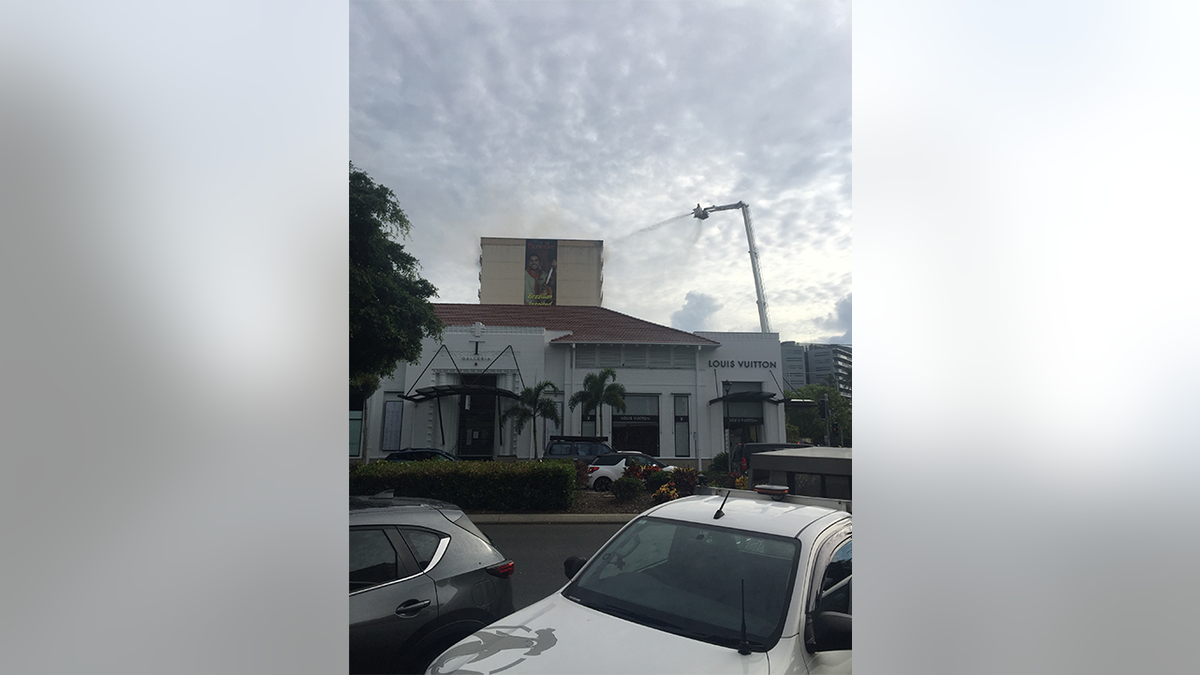 A fire is being extinguished at the Pacific Hotel, a COVID-19 quarantine venue, in Cairns, Australia Nov. 28, 2021 in this picture obtained from social media.