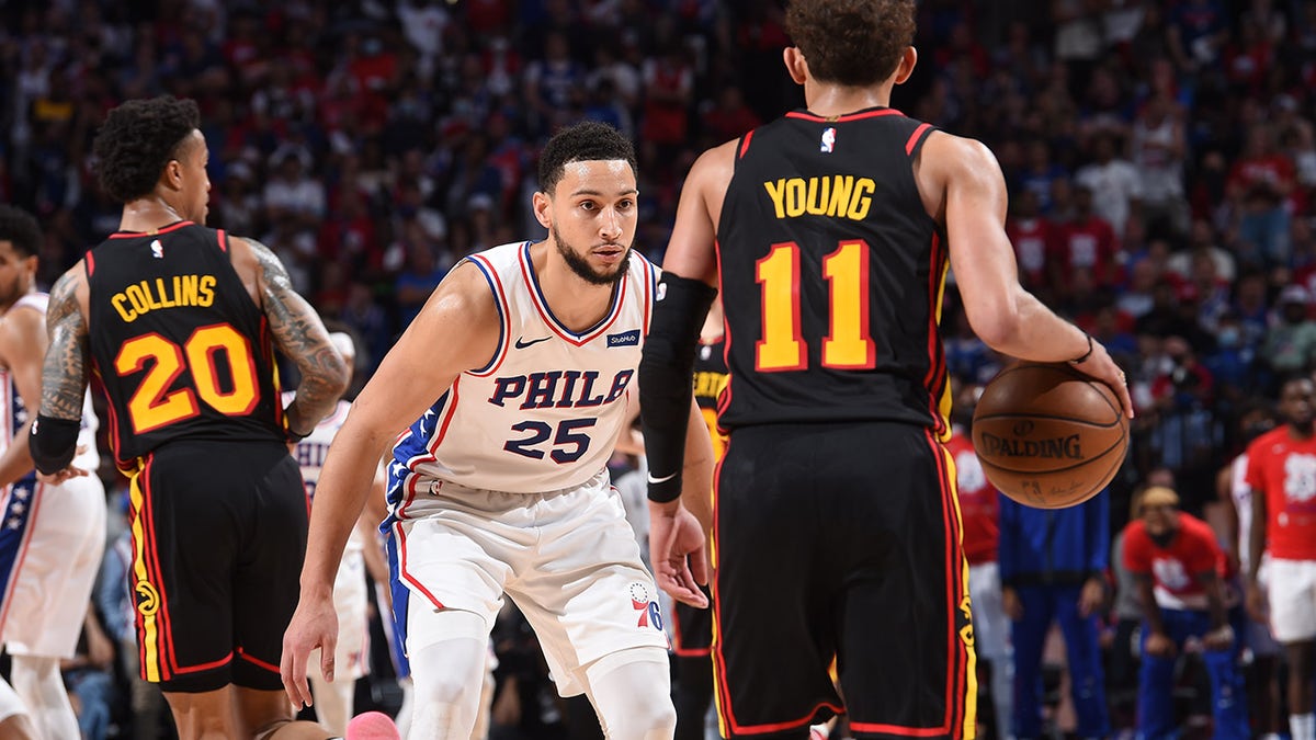 Ben Simmons #25 of the Philadelphia 76ers plays defense against Trae Young #11 of the Atlanta Hawks during Round 2, Game 7 of the Eastern Conference Playoffs on June 20, 2021 at Wells Fargo Center in Philadelphia, Pennsylvania.