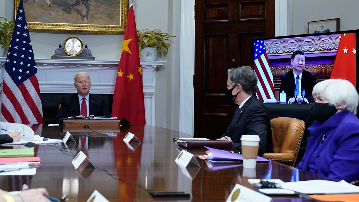 President Joe Biden meets virtually with Chinese President Xi Jinping