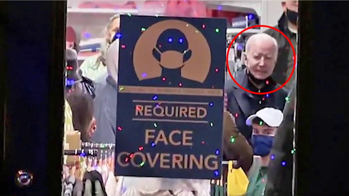 Biden spotted without mask in store that requires masks