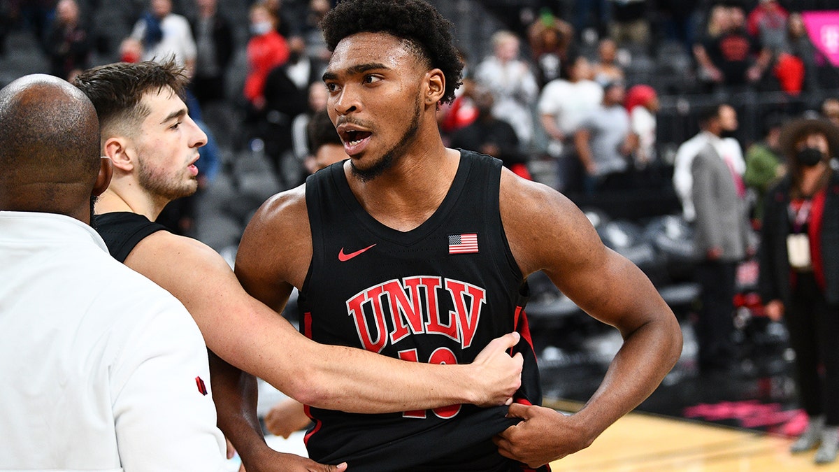 UNLV Rebels guard Bryce Hamilton is held back after the Nov. 21, 2021, game against the Wichita State Shockers at the T-Mobile Arena in Las Vegas, Nevada.